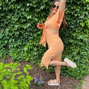 Dress with slits on both sides